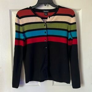 The size is a small but also fits medium! Beautifully made sweater.